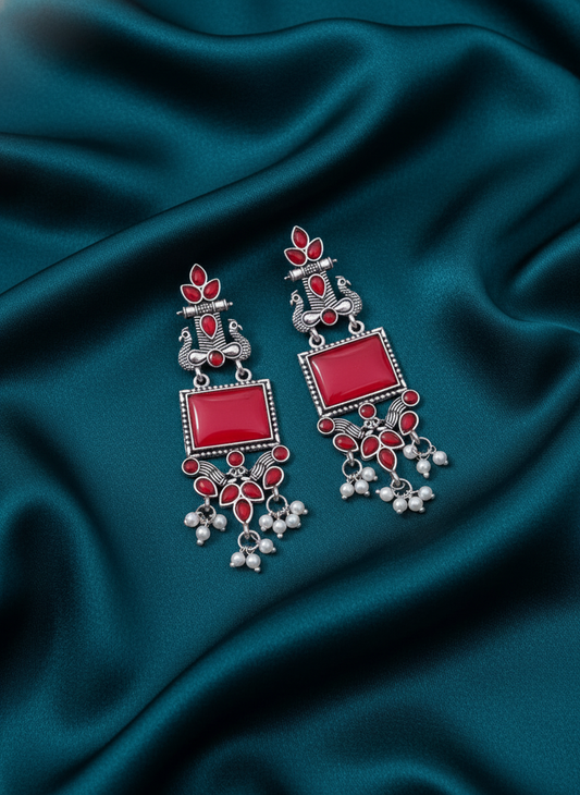 Stunning Oxidized Silver Peacock Jhumka Earrings with Vibrant Red Stones