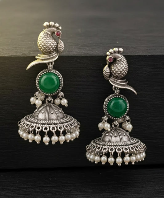Exquisite Oxidized Silver Peacock Jhumka Earrings with Green Stone & Pearls