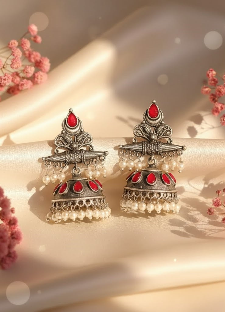 Exquisite Oxidized Silver Jhumkas with Red Stones & Pearl Drops