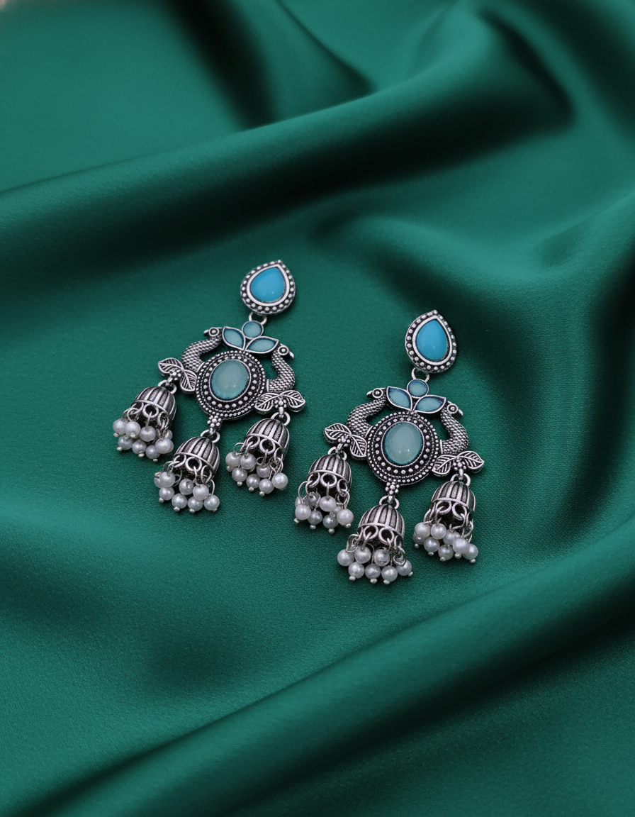 Exquisite Oxidized Silver Peacock Jhumka Earrings with Turquoise & Pearl Accents
