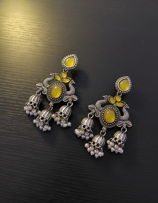 Stunning Oxidized Silver Peacock Jhumka Earrings with Yellow Stones