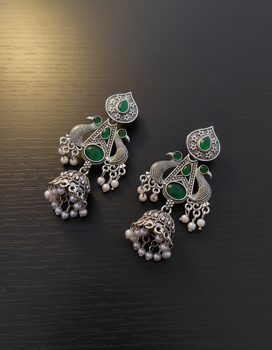 Exquisite Oxidized Silver Peacock Jhumkas with Emerald Green Stones