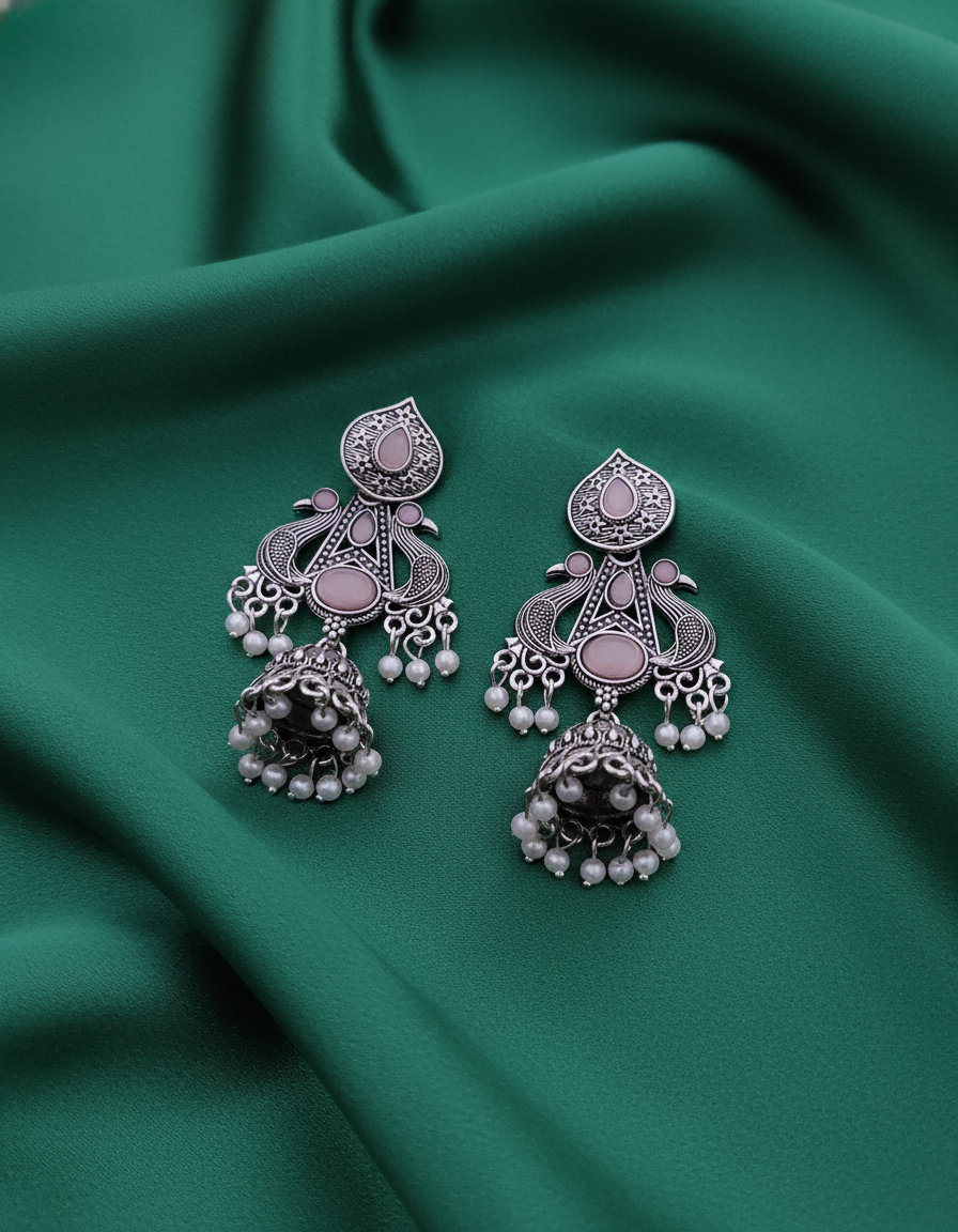 Stunning Oxidized Silver Peacock Jhumka Earrings with Pink Accent Stones