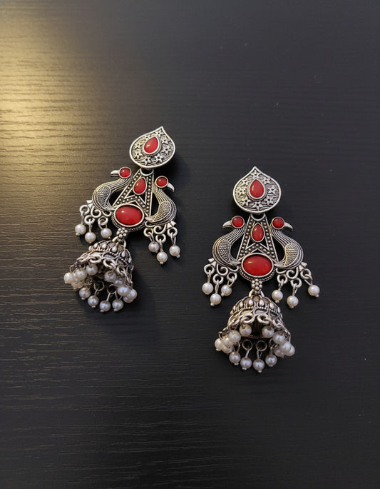 Exquisite Oxidized Silver Peacock Jhumka Earrings with Red Stones