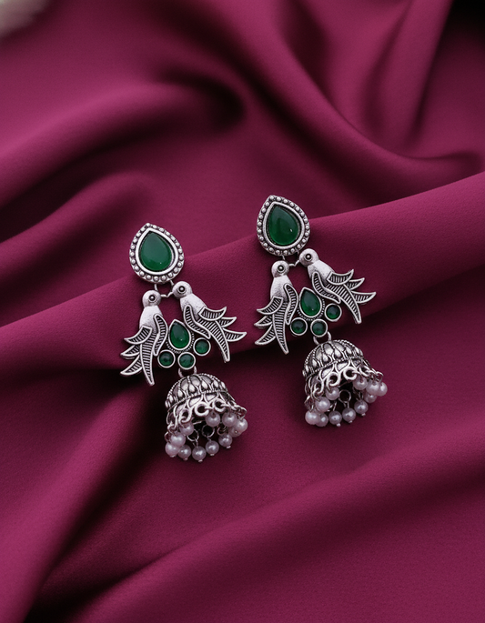 Exquisite Oxidized Silver Peacock Jhumka Earrings with Green Stones & Pearls