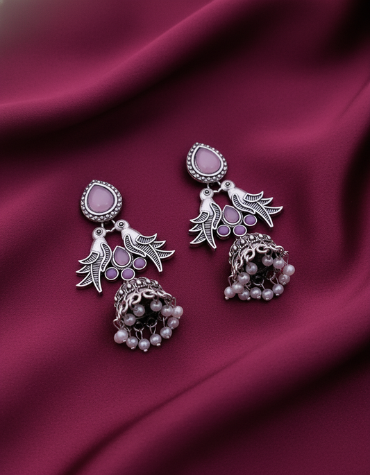 Exquisite Oxidized Silver & Gold Jhumka Earrings with Bird Design and Lavnder Stones