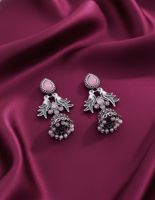 Exquisite Oxidized Silver Bird Jhumka Earrings with Pink Stones and Pearl Drops