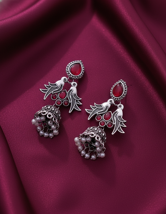 Exquisite Oxidized Silver Bird Jhumka Earrings with Rani Pink Gemstones and Pearls