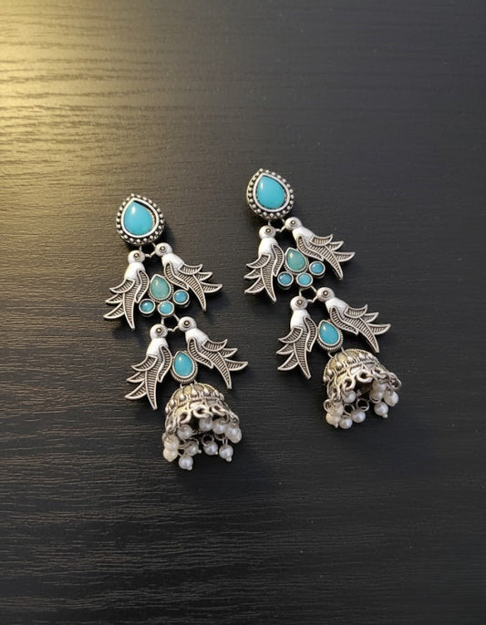 Exquisite Oxidized Silver Jhumka Earrings with Turquoise Bird & Pearl Design