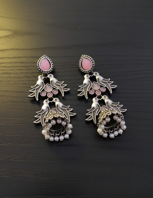 Exquisite Oxidised Silver Bird Jhumka Earrings with Pink Accents