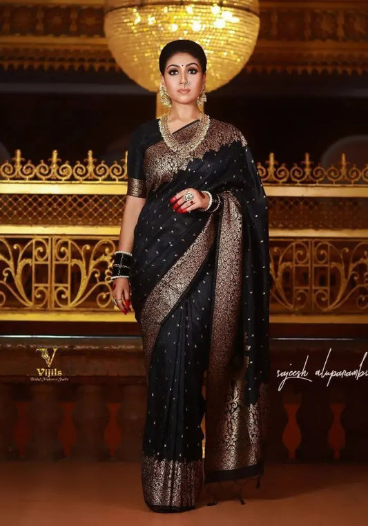 Elegant Black Kanjivaram Silk Saree with Rich Gold Zari Work – Traditional Bridal Wear