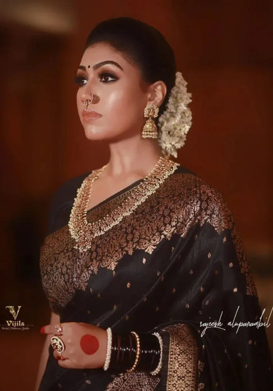 Elegant Black Kanjivaram Silk Saree with Rich Gold Zari Work – Traditional Bridal Wear