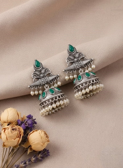 Exquisite Oxidized Silver Jhumka Earrings with Green Stones & Pearl Drops