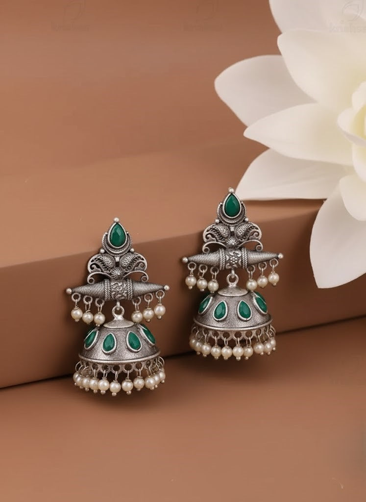 Exquisite Oxidized Silver Jhumka Earrings with Green Stones & Pearl Drops