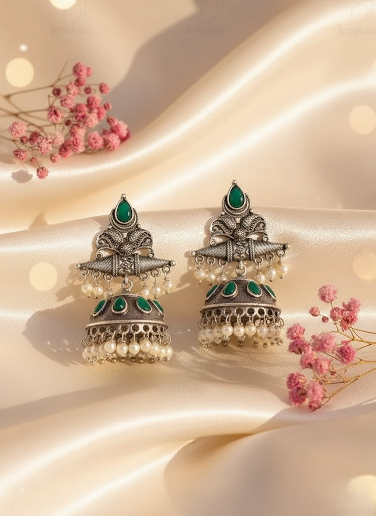 Exquisite Oxidized Silver Jhumka Earrings with Green Stones & Pearl Drops