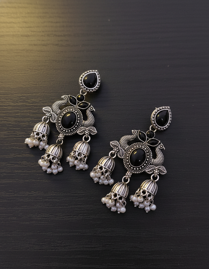 Exquisite Oxidised Silver Peacock Jhumka Earrings with Black Onyx & Pearl Drops