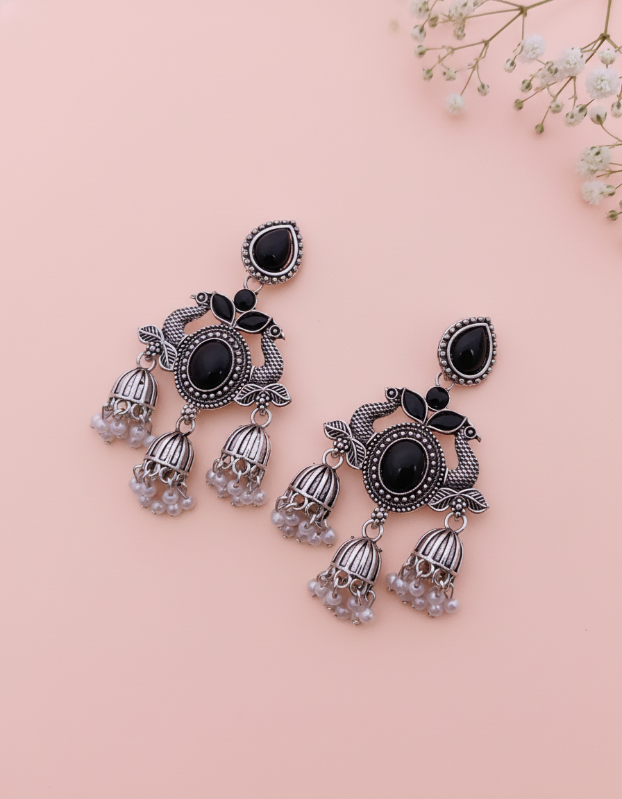 Exquisite Oxidised Silver Peacock Jhumka Earrings with Black Onyx & Pearl Drops