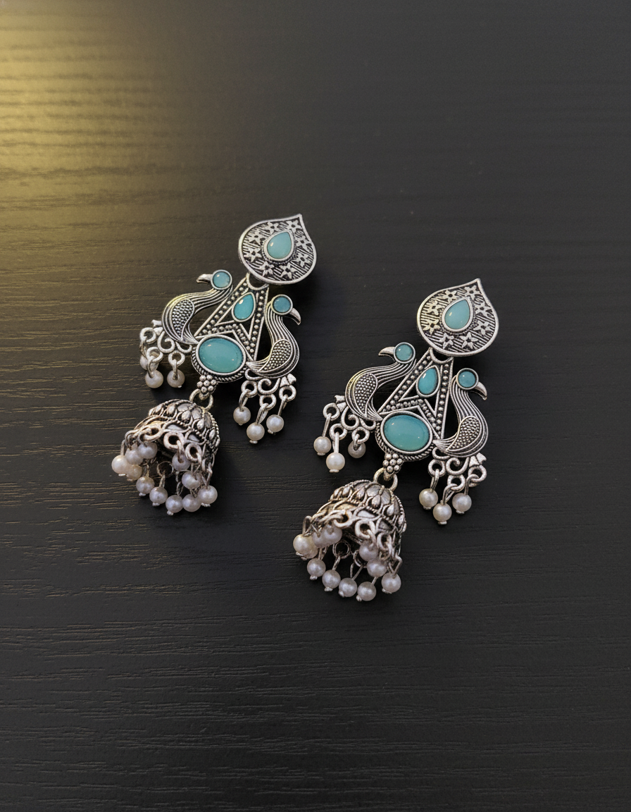 Exquisite Oxidized Silver Peacock Jhumka Earrings with Teal Stones