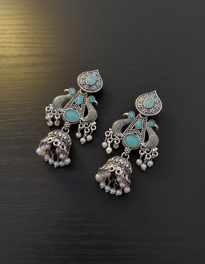 Exquisite Oxidized Silver Peacock Jhumka Earrings with Teal Stones