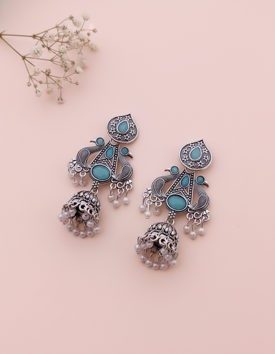 Exquisite Oxidized Silver Peacock Jhumka Earrings with Teal Stones