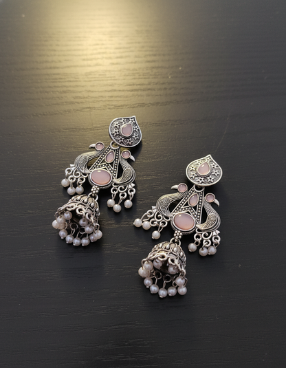 Stunning Oxidized Silver Peacock Jhumka Earrings with Pink Accent Stones