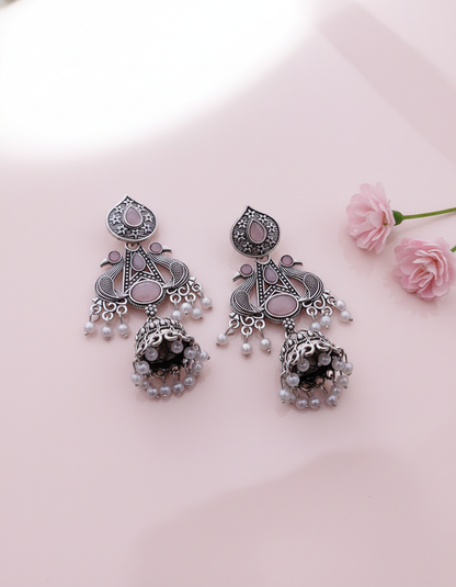 Stunning Oxidized Silver Peacock Jhumka Earrings with Pink Accent Stones