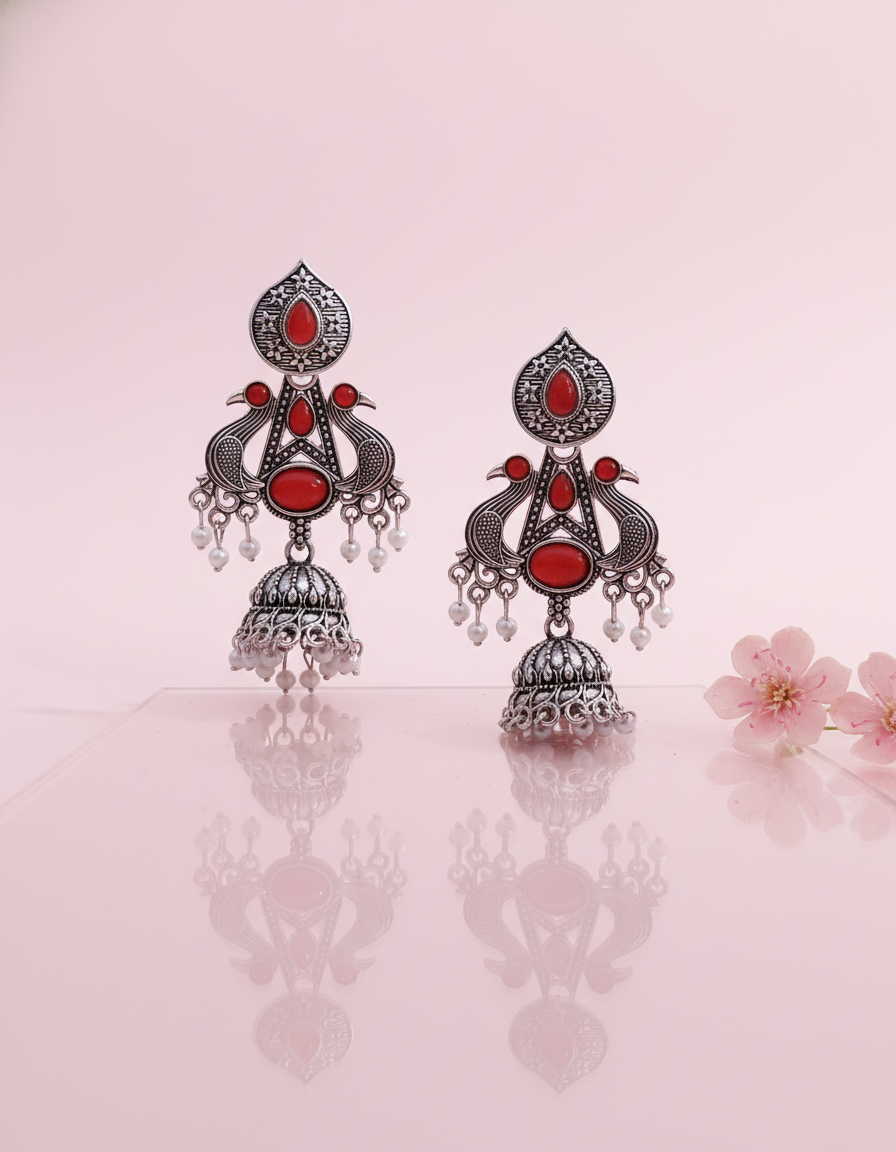 Exquisite Oxidized Silver Peacock Jhumka Earrings with Red Stones