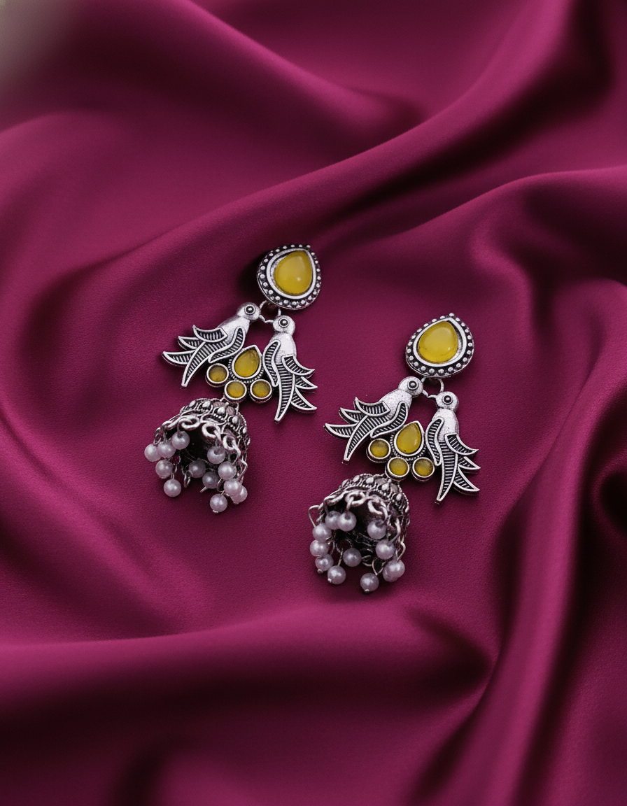 Exquisite Oxidized Silver Peacock Jhumka Earrings with Yellow Stones