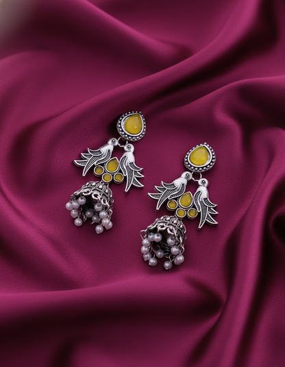 Exquisite Oxidized Silver Peacock Jhumka Earrings with Yellow Stones