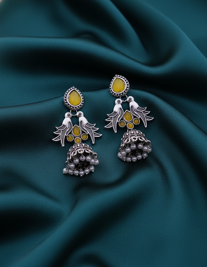 Exquisite Oxidized Silver Peacock Jhumka Earrings with Yellow Stones