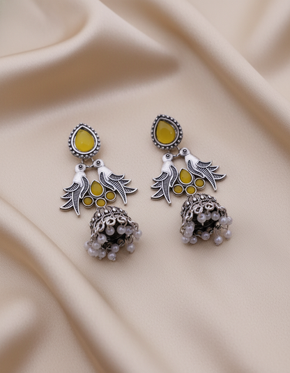 Exquisite Oxidized Silver Peacock Jhumka Earrings with Yellow Stones