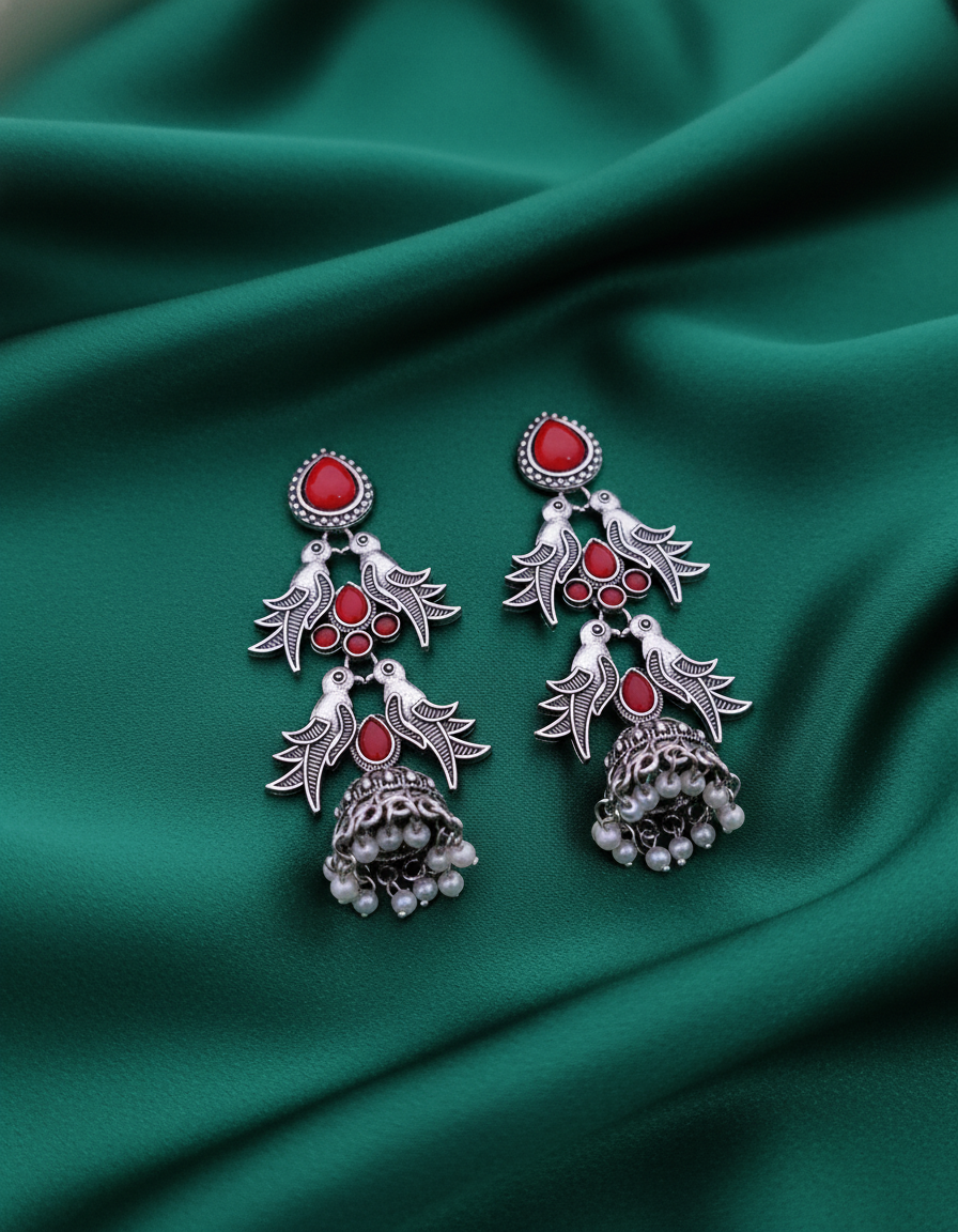 Exquisite Oxidized Silver Jhumka Earrings with Red Stone Bird Motif