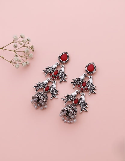 Exquisite Oxidized Silver Jhumka Earrings with Red Stone Bird Motif