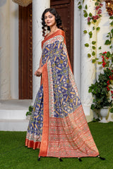 Indigo Radiance: Elegant Patola Print Art Silk Saree with Zari Border
